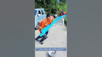 Road Workers Installing Corrugated Guardrails: A Vital Safety Step