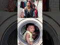 a cute baby sitting in a washing machine💌💟❣️😍귀여운 아기가 세탁기 안에 앉아 있다