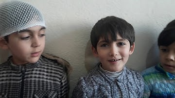 سورة القارعة بصوت مجموعة من الأطفال
