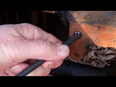 Removing Rusty Broken Bolt Threads using a Home-Made Chisel from a ...