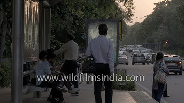 Fast moving traffic near Lodhi Colony bus stop, New Delhi