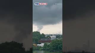 A Funnel Swirls From Ominous Dark Clouds Over New Jersey