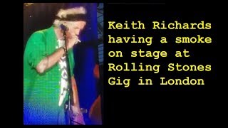 Keith Richards Smoking on Stage with a filter at no filter - as the crowd cheer