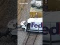Train hits FedEx truck in Texas