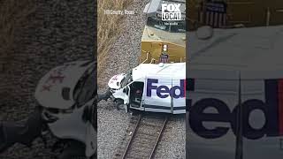 Train hits FedEx truck in Texas