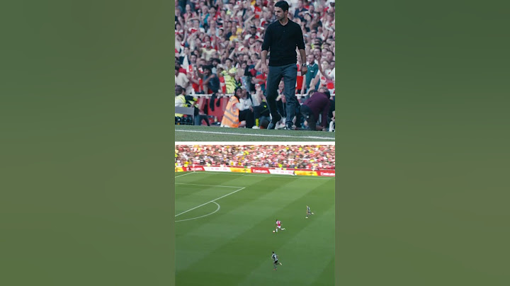 Arteta and the Arsenal bench react to Gabriel Jesus' goal against Manchester United