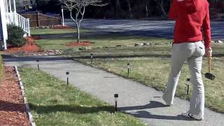 Girl Poking With A Stick