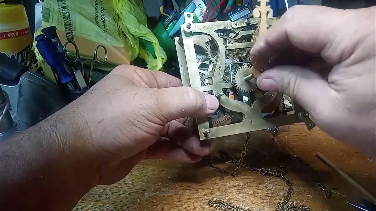 How to adjust the hands on an antique cuckoo clock so it cuckoos at
