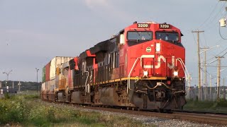 Friendly Hogger on a Huge Stack Train CN 120 w/ex CREX Unit at Moncton, NB