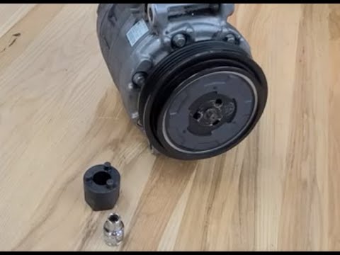 Video: Puas yog AC pulley ib txwm tig?