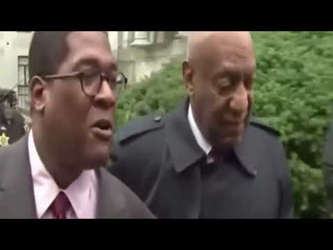 Bill Cosby dances out of court