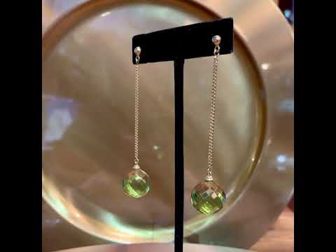 Disco ball earrings in green amber, cut in Idar Oberstein, Germany