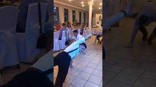 break dancing from the groom's friends at the wedding