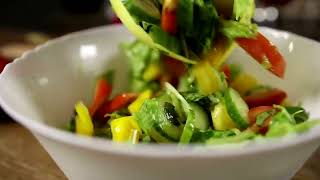 Mixing a fresh salad with oil copyright free fruits and vegetables video screenshot 4