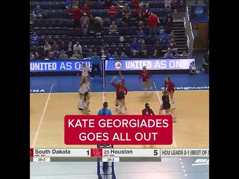 Table-crashing rally save in college volleyball 😱