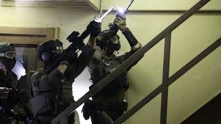 U.S. Marine Corps Special Reaction Team Marines perform close-quarter combat tactics range