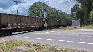 CSX 405 and CSX 5299 lead a north bound empty coal train across Whitfield Street 6/25/2026