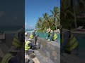 Uses natural volcanic stones to keep water cool.#infinitypool #beachlife #construction #timelapse