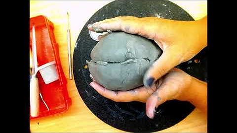 Connecting two pinch pots, creating a hollow form