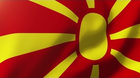 Macedonia Flag Waving In The Wind. Looping Sun Rises Style. Animation Loop Stock Animation
