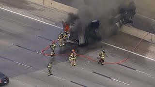 Raw video: Firefighters put out burning box truck on North Loop
