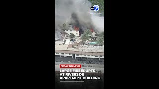 Large fire erupts at Riverside apartment building