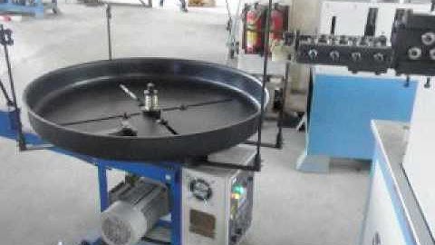 Automatic spring winding machine