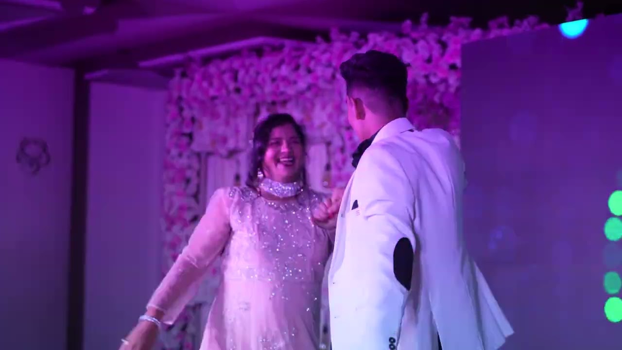 son & mom dance at 25th anniversary video