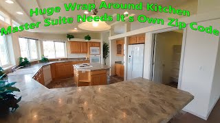 Huge wrap around kitchen (over 2700sf) Master bedroom area is larger than an entire single wide.