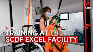 CNA gets a taste of firefighter and emergency responder training at SCDF's new EXCEL facility News