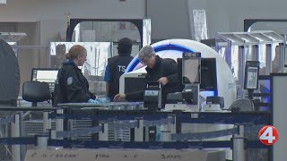 Travelers at Buffalo airport react to nationwide ICE news