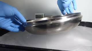 Spinning Lid to Make Groove on Ice. Shows the Precession Momentum Wave Pulse.