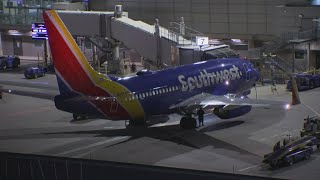 Family inside Southwest plane struck by bullet says they were never told about the incident