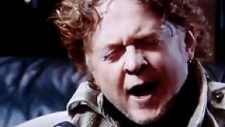 Video thumbnail of "Simply Red - Holding Back The years"