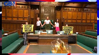Extinction Rebellion activists SUPERGLUE themselves in Commons chamber