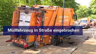 Müllwagen in Straße eingebrochen: Video von der Bergung