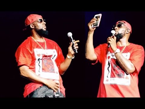 R. Kelly Rubs A Fan's Phone All Over His Crotch At First Concert After Sex Cult Accusations
