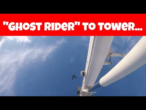 Military plane does a flyby on the crane | Plane buzzes crane
