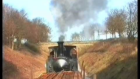 LSWR B4 Normandy hauls a works train on the Bluebell Railway