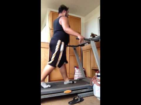 Dog tries to bite my feet while I run on the Treadmill
