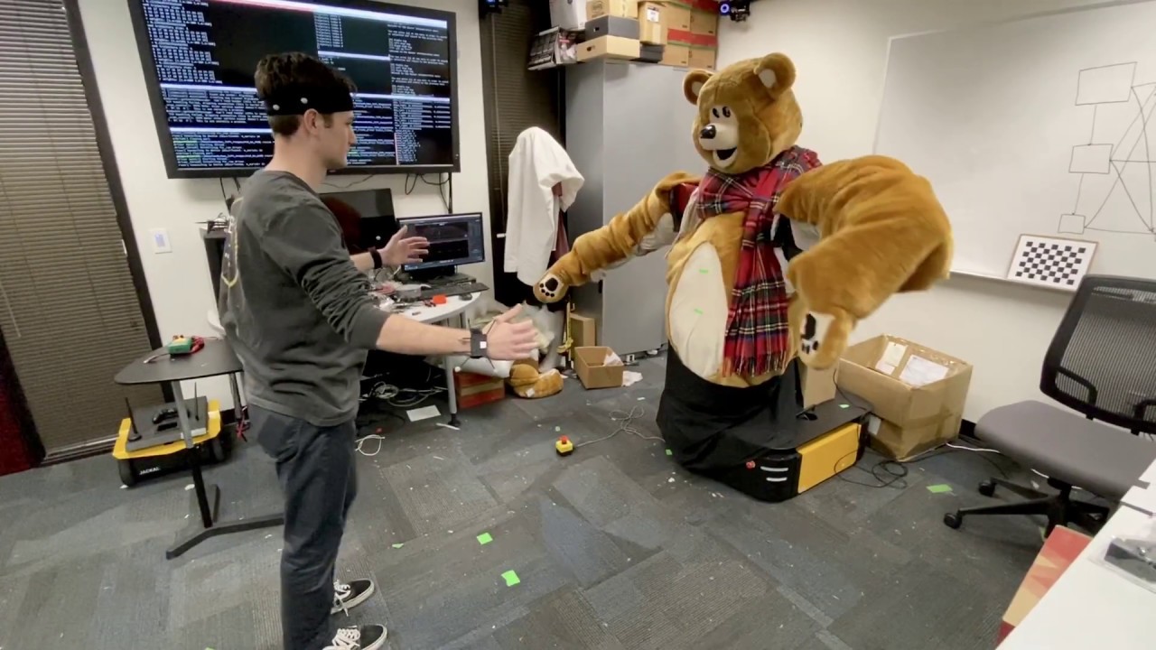 Learning to Hug with Bayesian Interaction Primitives