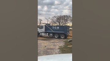A Bobcat loading a Dump Truck?  Is this reality?