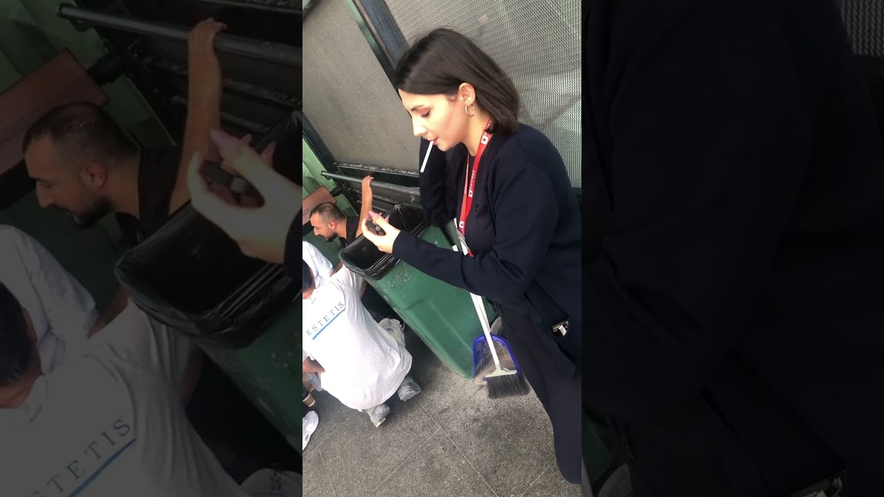 Beautiful Turkish girl smoking at airport