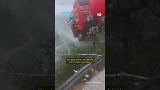 Moment Truck With Driver Inside Hangs Precariously Over Edge Of Collapsed Bridge In China Dw News