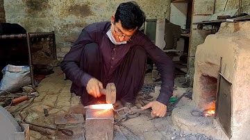 Talented Blacksmith Forging An Amazing Scissors