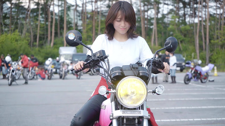 Beautiful women riding on Kawasaki