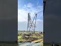 Raising the Giants: How Improvised Pulley Systems Erect Power Towers #shorts