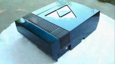 Custom chameleon Zelda NES with Triforce window and matching controllers