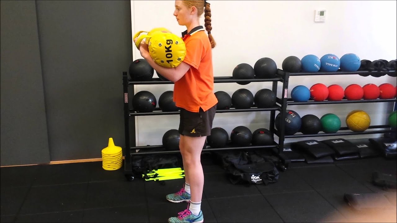 Squat with weight bag YouTube