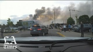 Violent protests after the death of George Floyd continued for a second day in Minneapolis